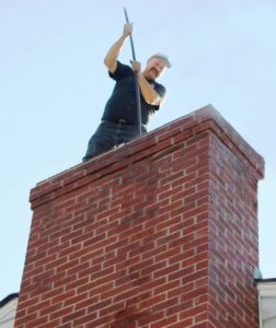 smoky fireplace startup blockage being removed